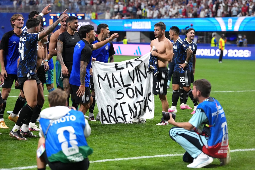 Argentina players hold up Falklands Islands banner after World Cup semi-final